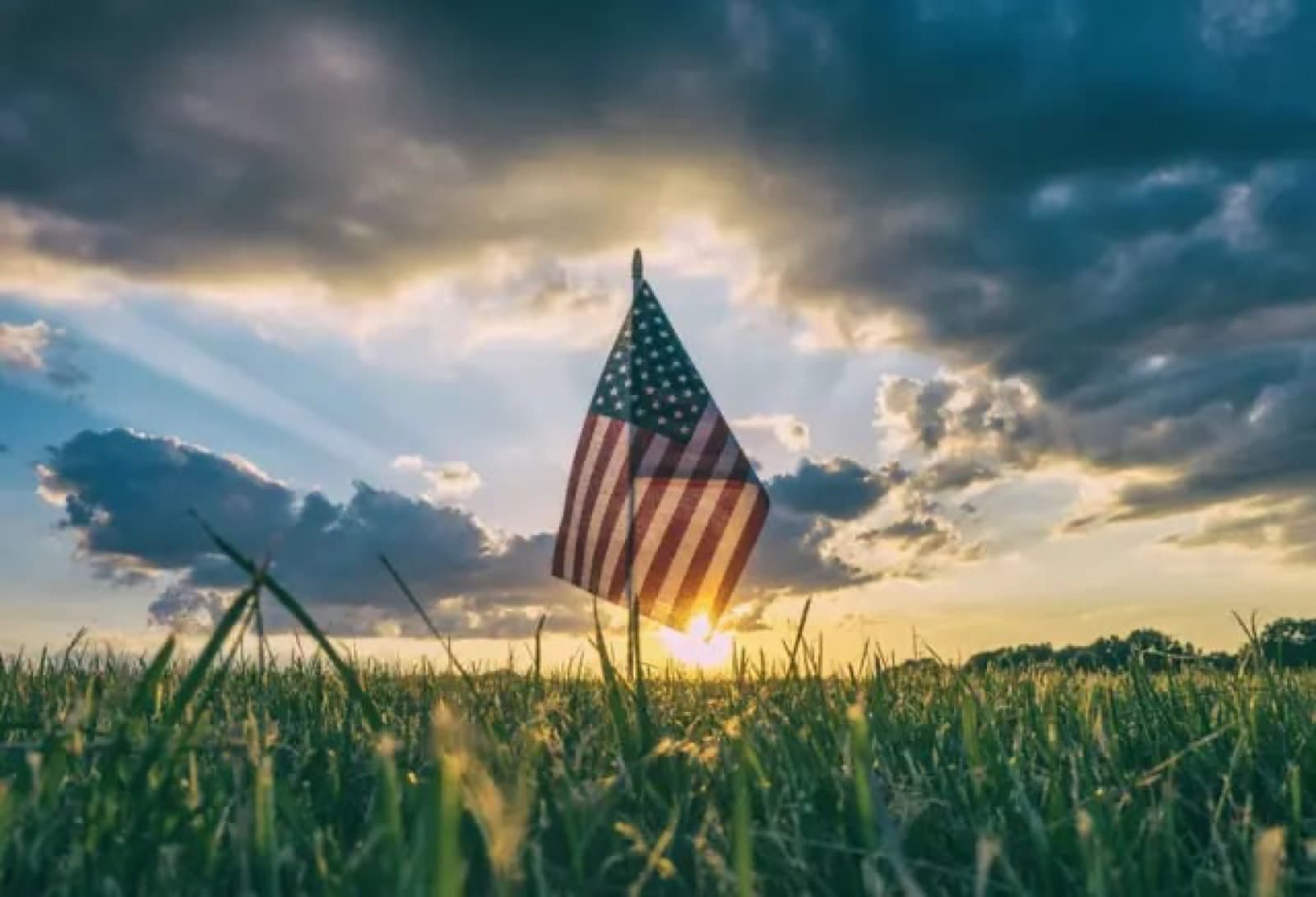 An American flag at sunset